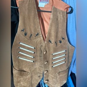 Mens vintage western cowboy suede vest with Native American accents.